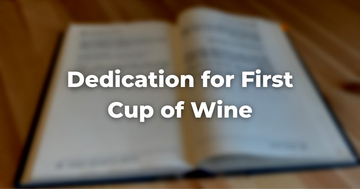 blurry image of a book with the words Dedication for First Cup of Wine